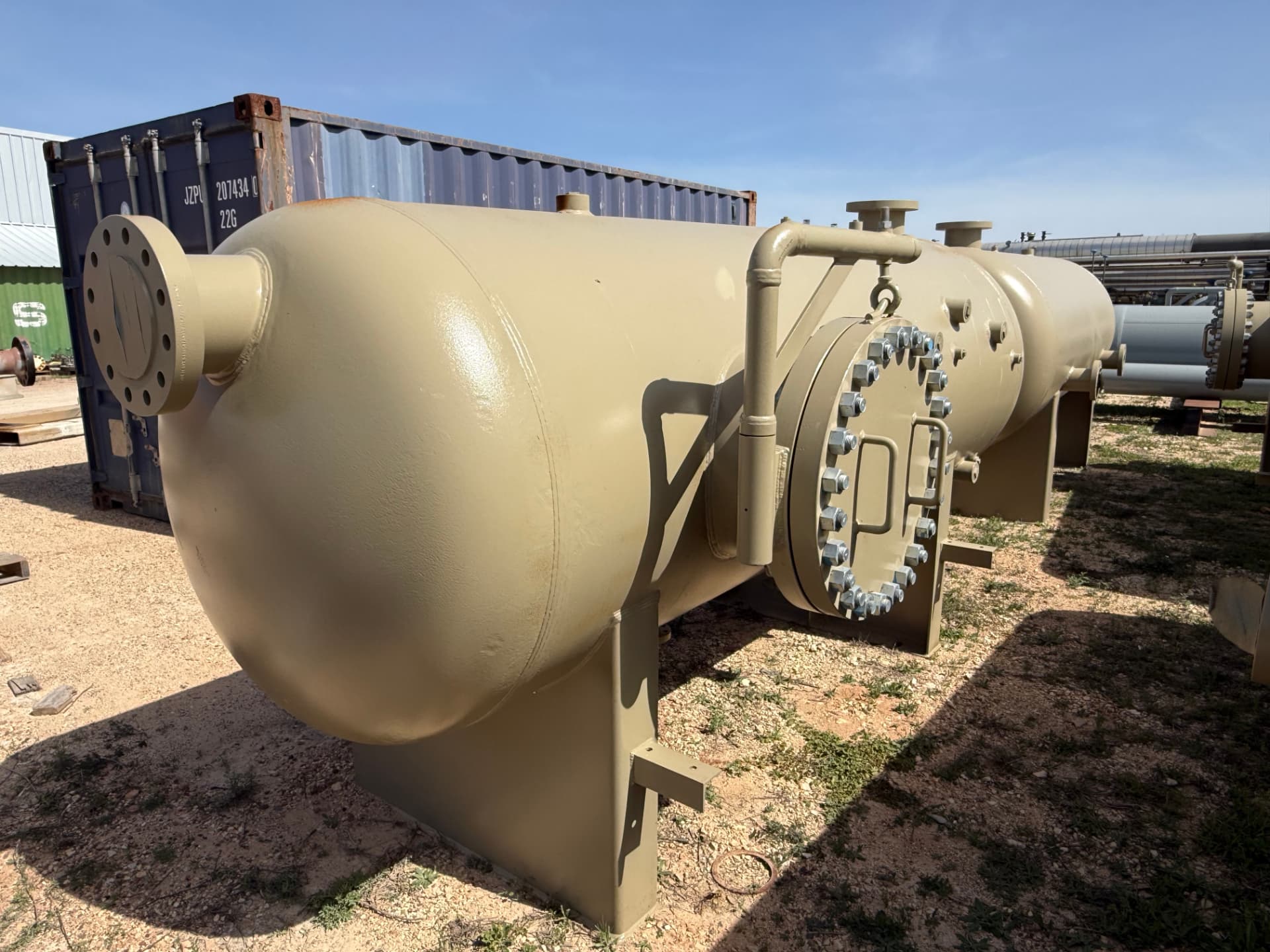 Tan two-barrel horizontal separator angled view