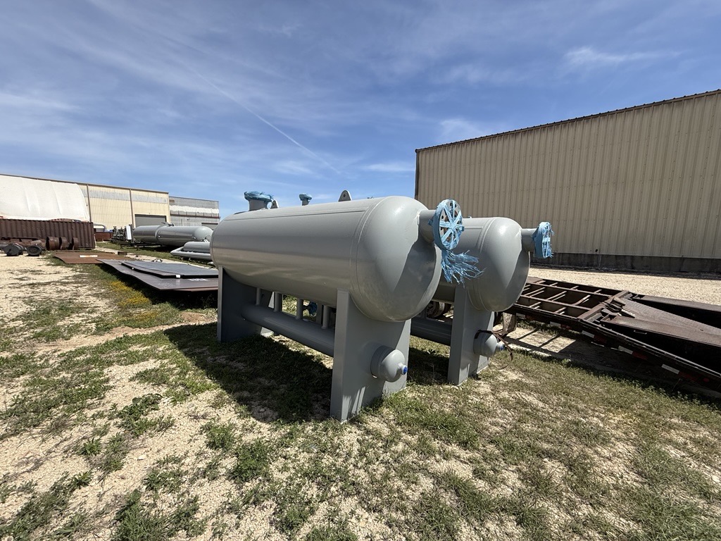 Two grey horizontal separators outside industrial building