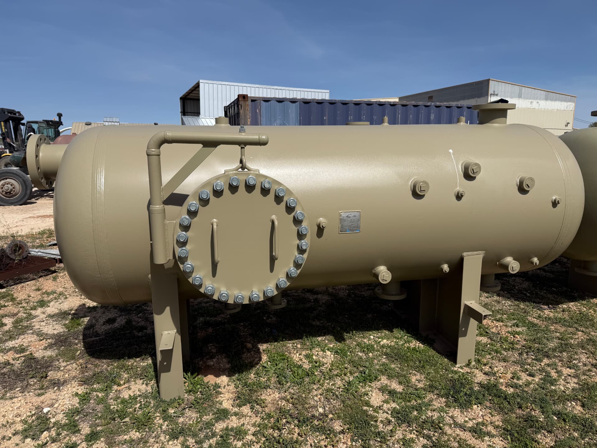 Tan horizontal separator with bolted manway