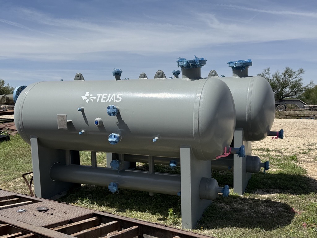 Twin grey Tejas separator vessels with blue-tagged nozzles