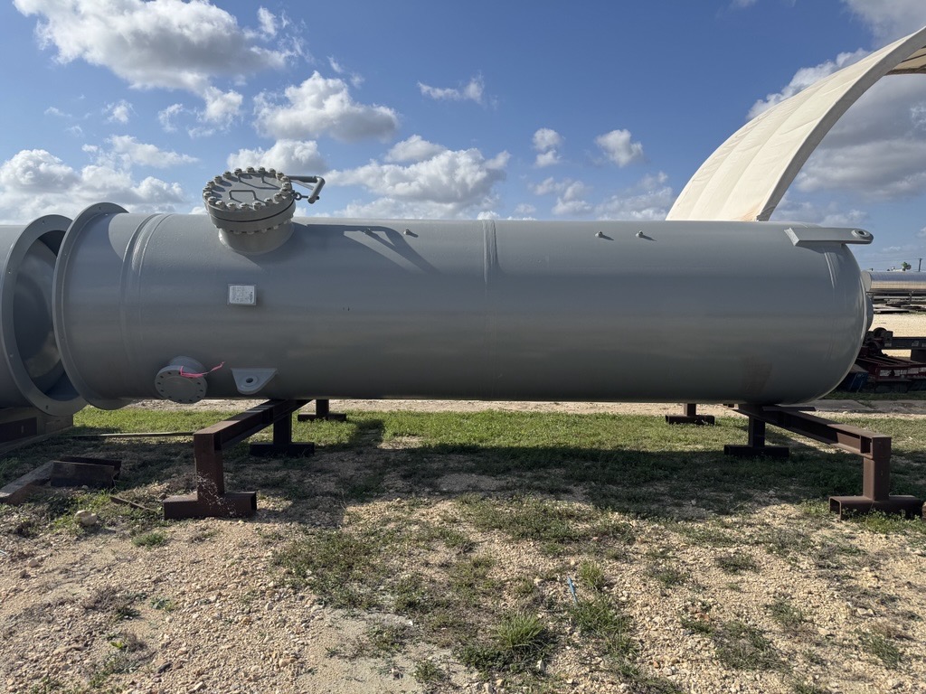 Long grey horizontal separator vessel on steel supports